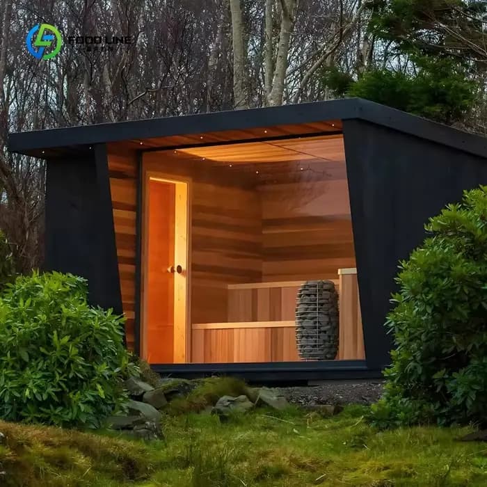 Sauna extérieur design moderne en cèdre rouge avec bancs confortables, douche et toit résistant à l'