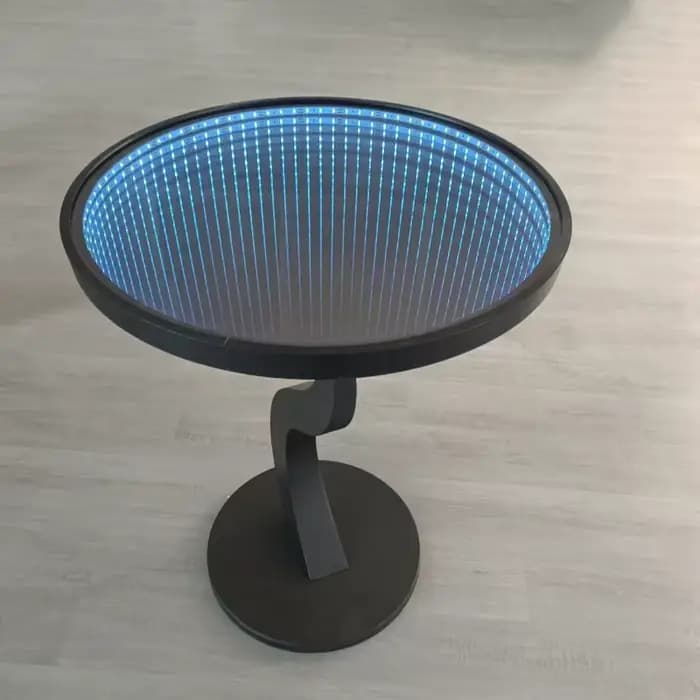 Table basse ronde éclairée en métal