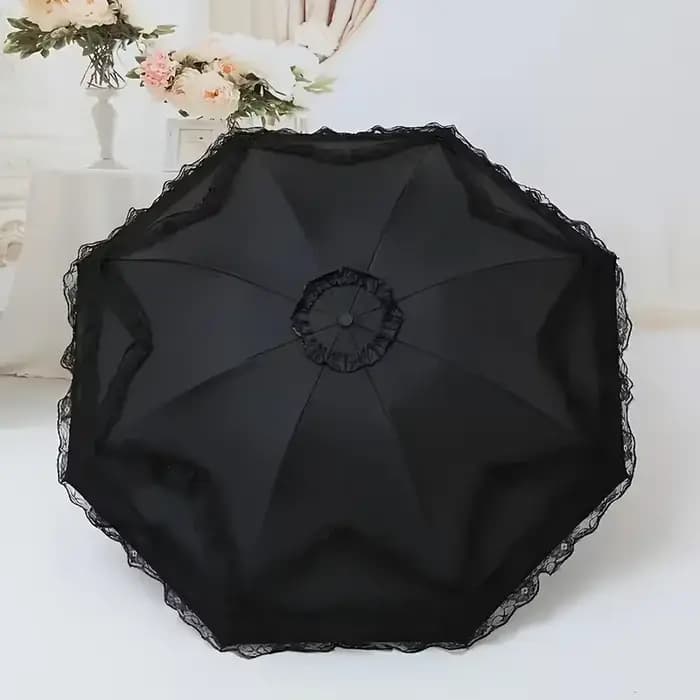Parasol vintage en dentelle pliable