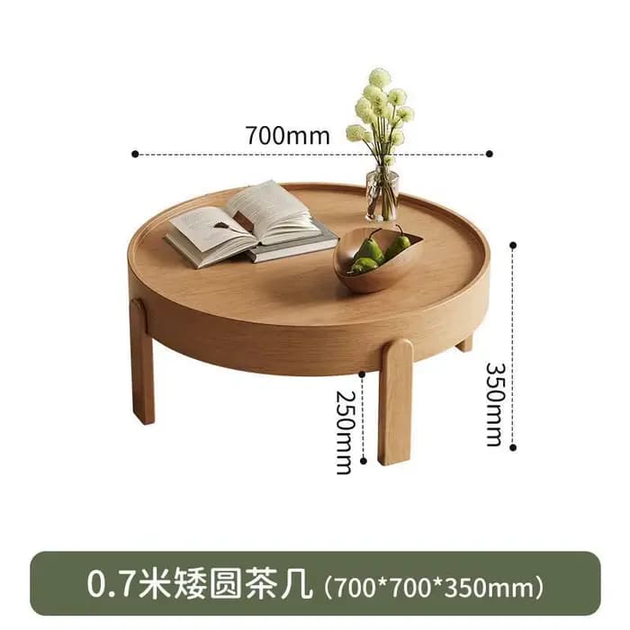 Petite table basse ronde avec plateau de couleur crème, coins arrondis simples pour éviter les chocs