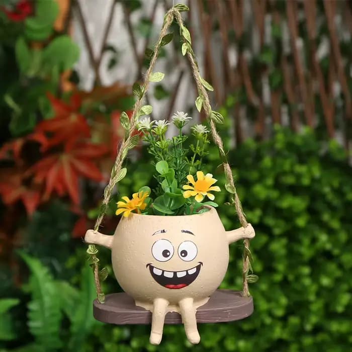 Jardinière de visage de sourire de chaise/balançoire
