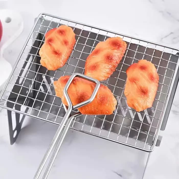 Réchaud de camping avec grille de barbecue