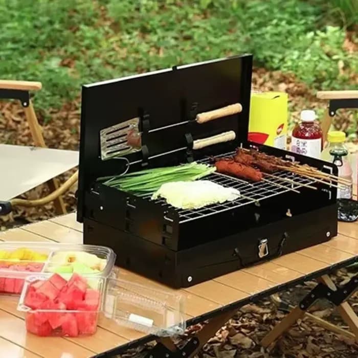 Barbecue portable pliable au charbon de bois avec poignée